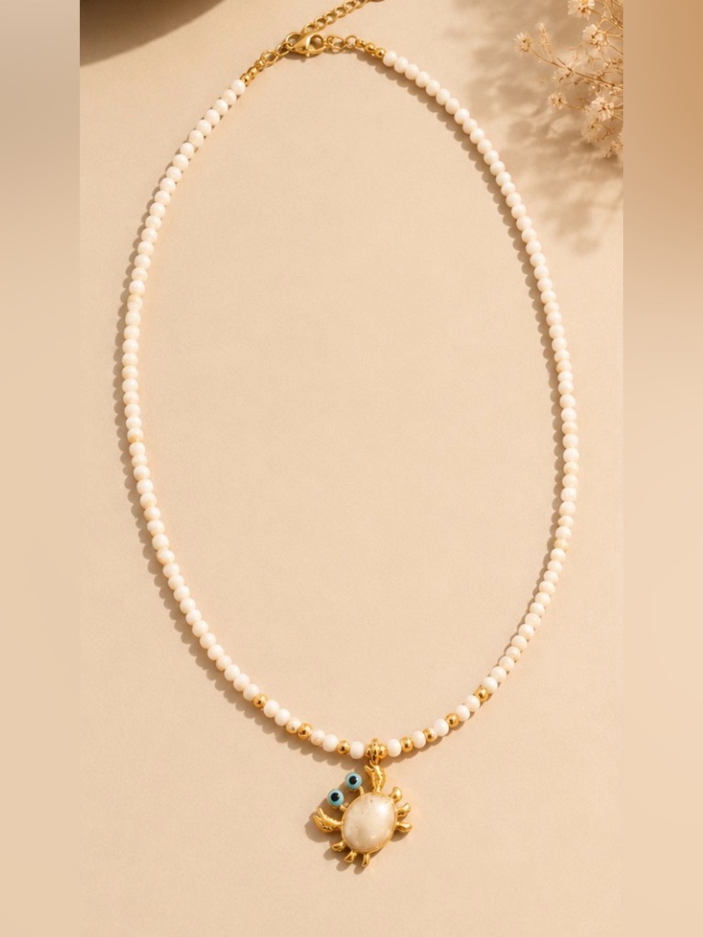 Cream Beaded Necklace with Gold Crab Pendant: Cancer Zodiac Sign